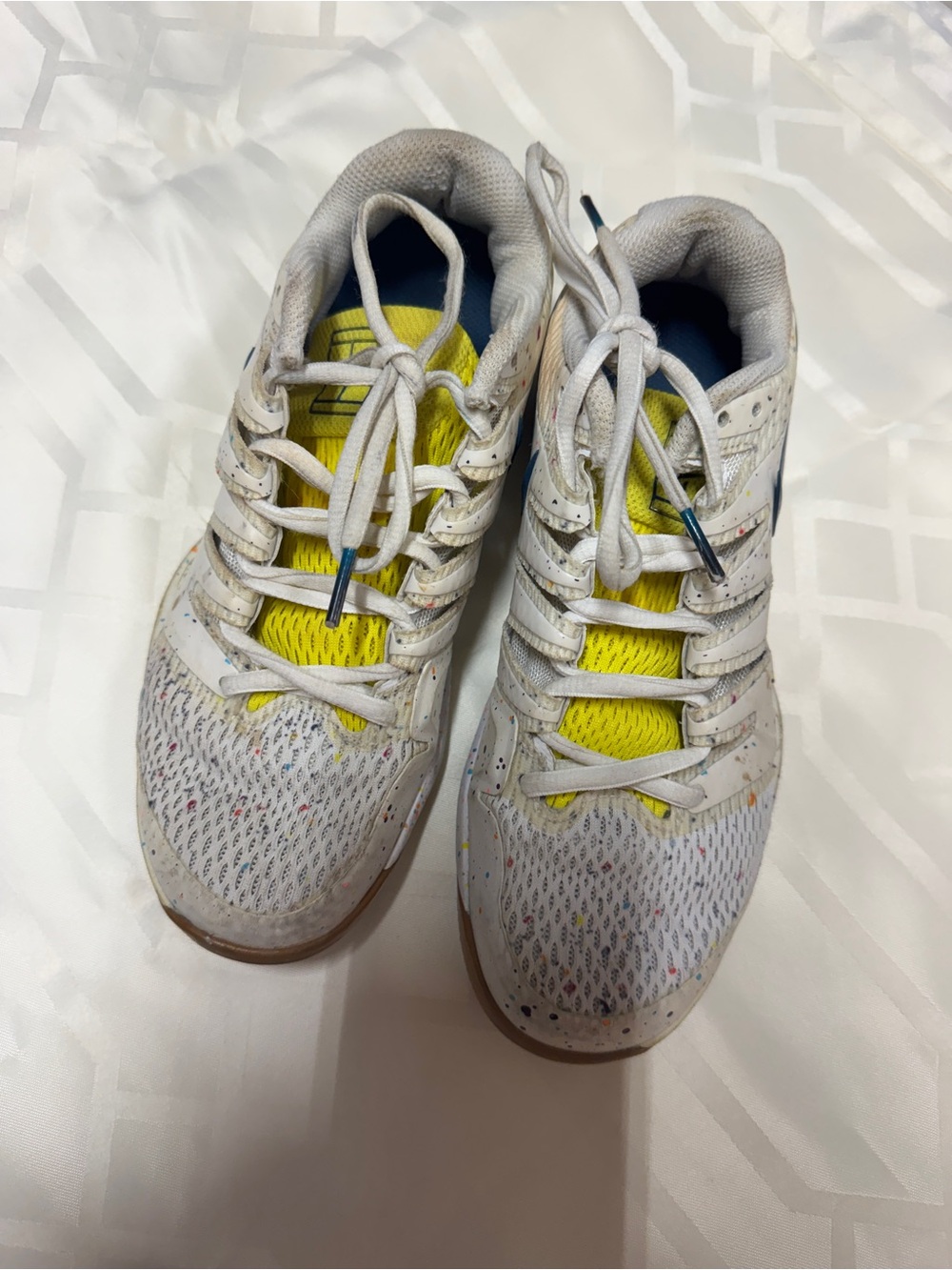 Nike Kids White Sneakers with Yellow Tongue and Blue Accents
